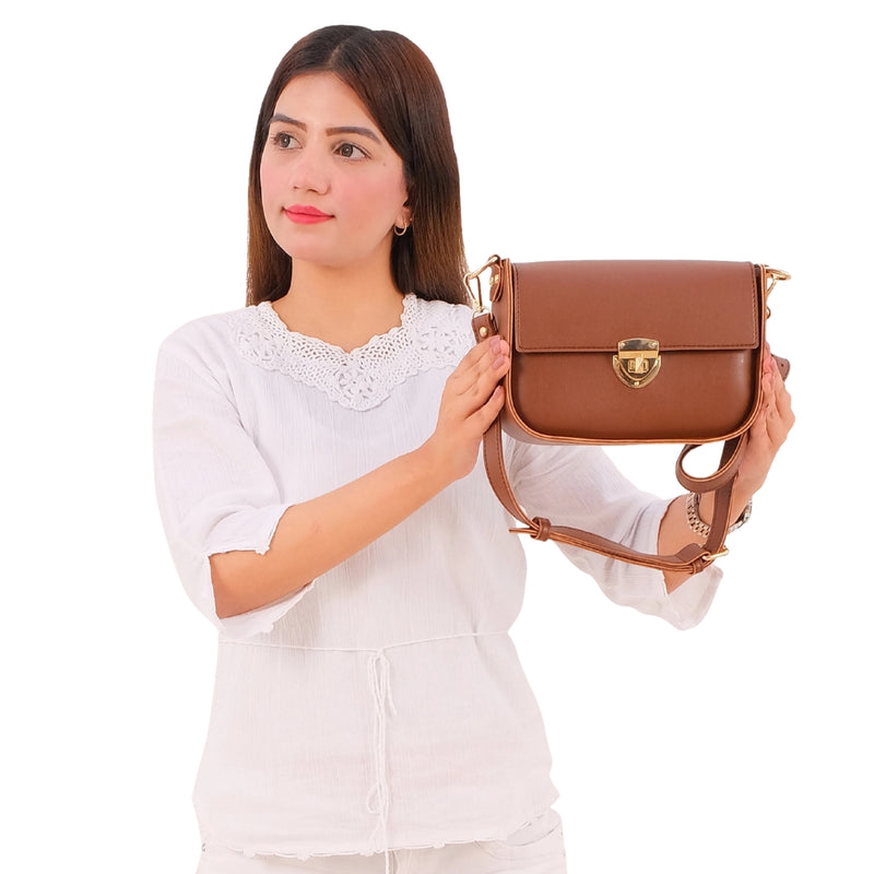 Bagoras Brown Saddle Bag Featuring a Twist Lock